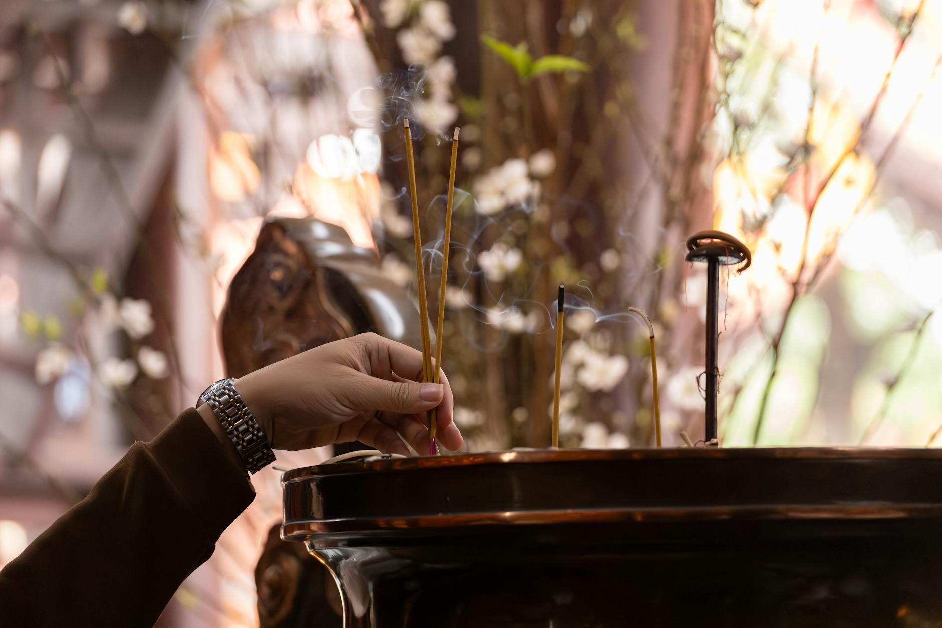Hanoi Old Quarter ancient temple with incense offerings