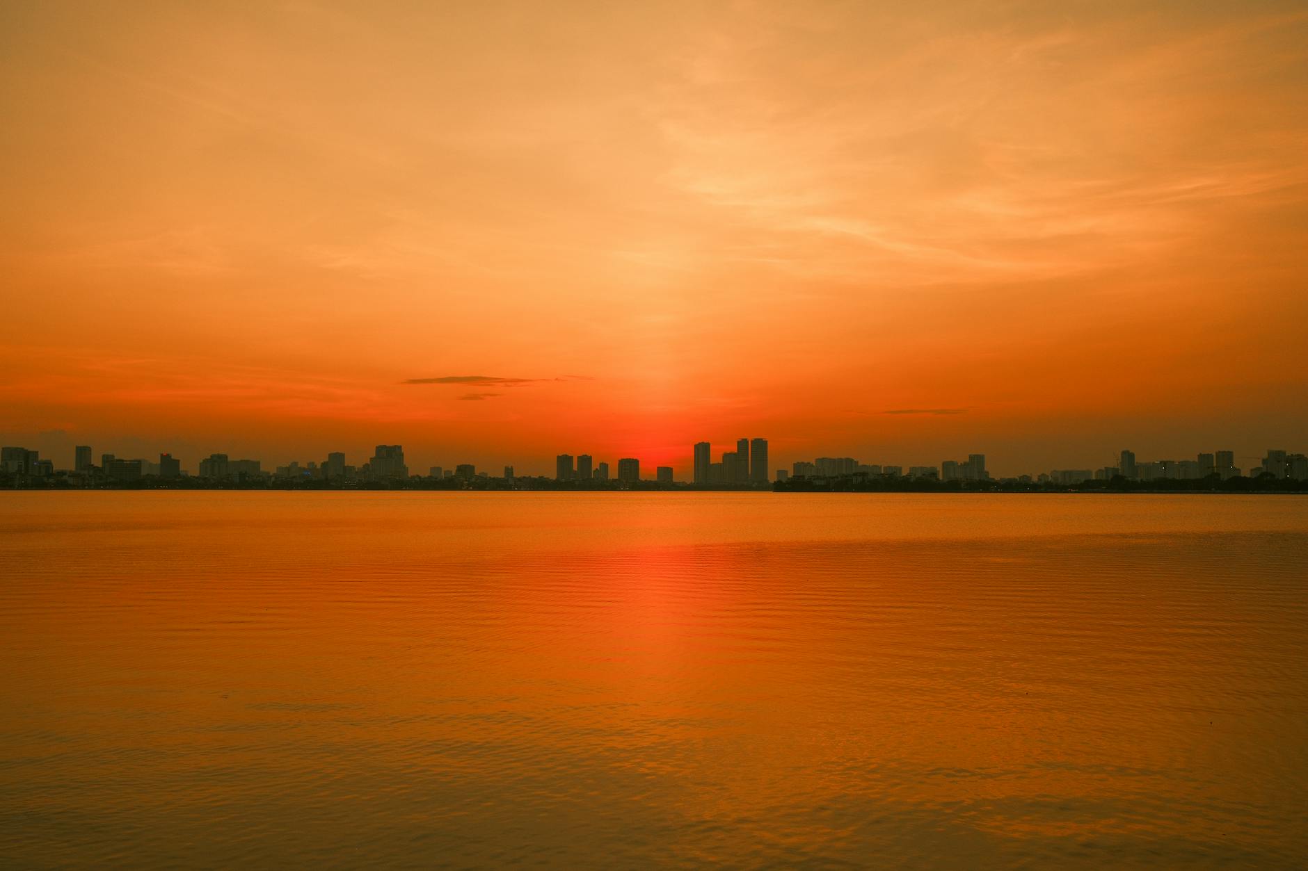 Where to stay in Hanoi - scenic West Lake Tay Ho neighborhood at sunset