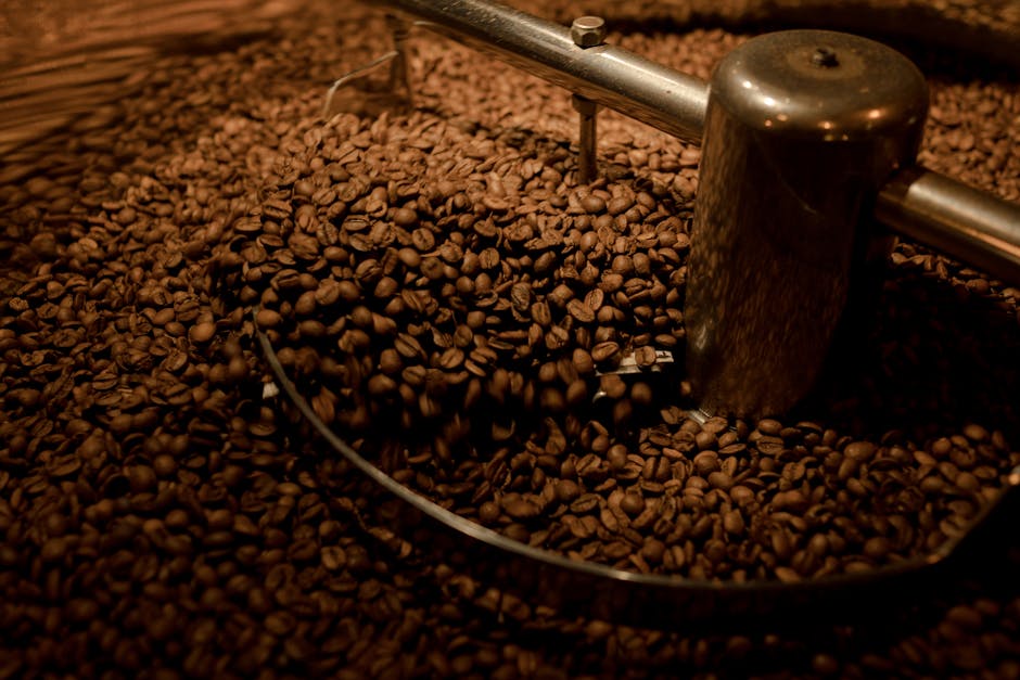 Coffee beans being roasted industrially