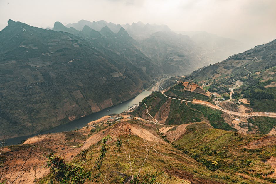 Aerial view of Ha Giang river valley with karst mountains