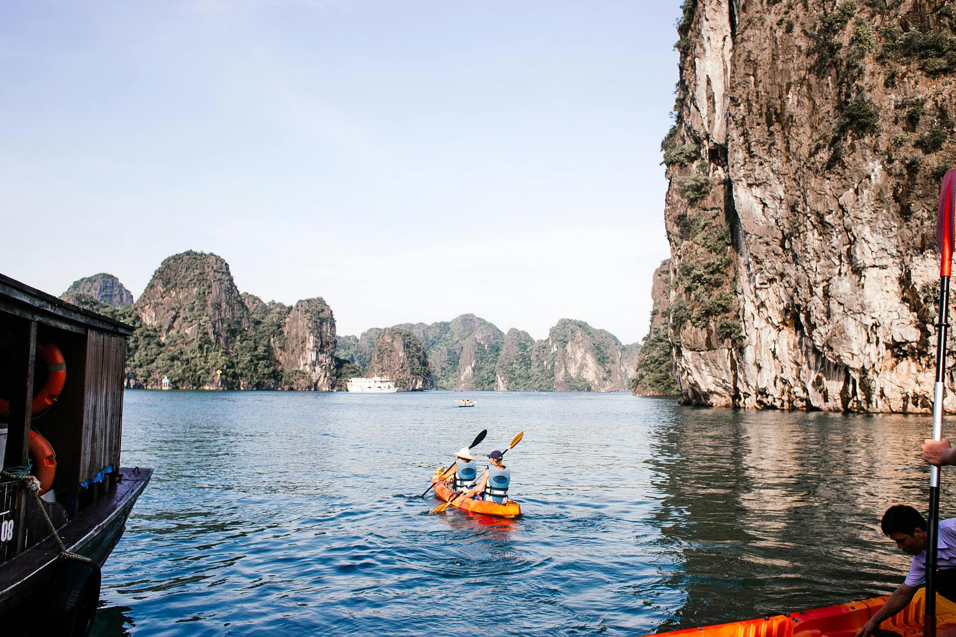 Kayaking in a breathtaking limestone bay near Hanoi