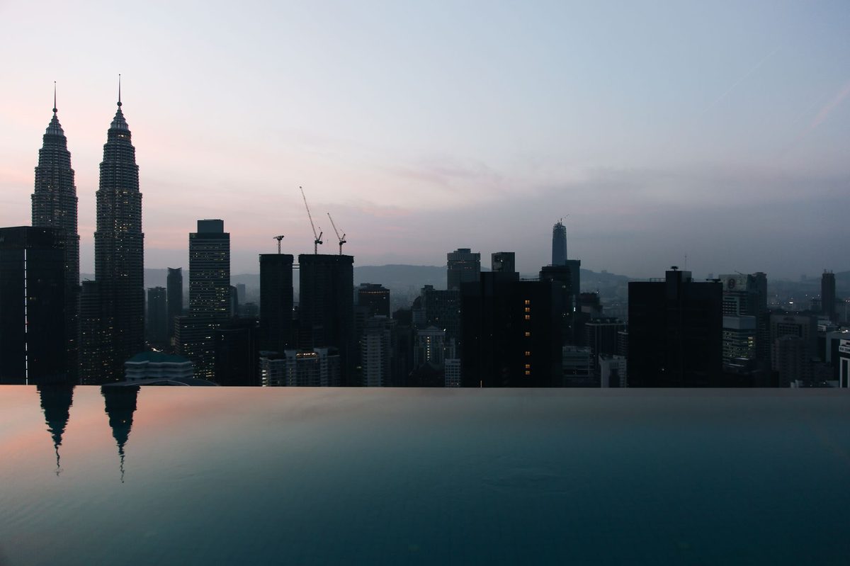 Hanoi Luxury Hotels: 10 Best 5-Star & High-End Stays (2026) 4 A rooftop infinity pool at a luxury hotel overlooking Hanoi
