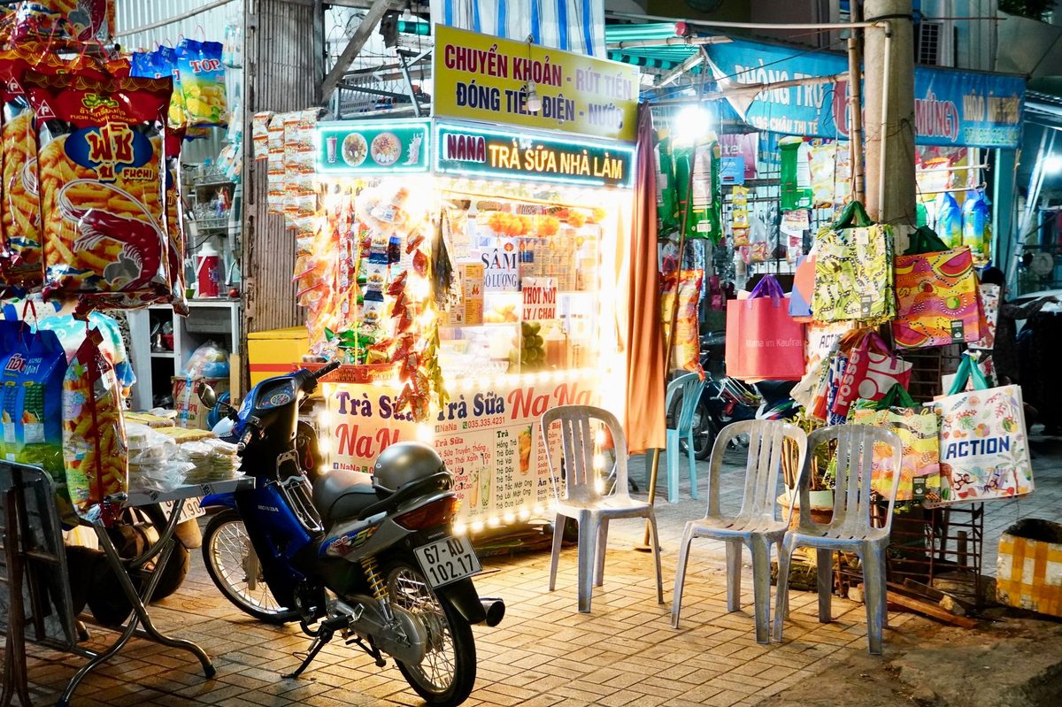 Browsing the Hanoi Old Quarter weekend night market