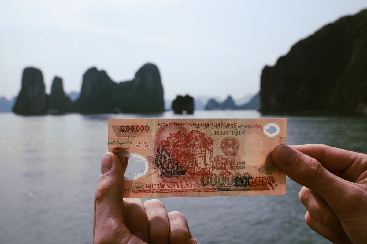 Hanoi Safety Tips: Complete Practical Guide for Travelers (2026) 4 Vietnamese dong banknotes — knowing the currency helps you avoid money scams in Hanoi